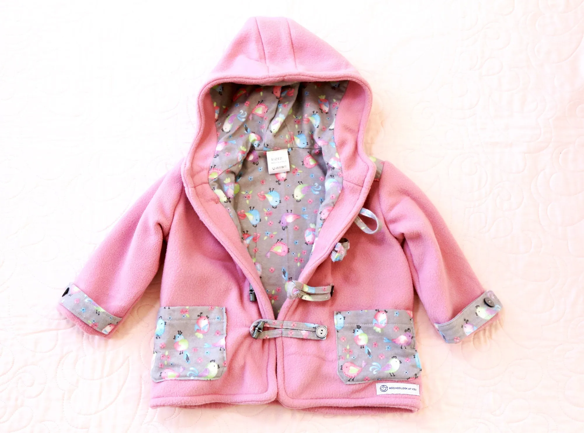 Coat - Duffle Coat - Pink Polar Fleece, Lining, Pockets and Toggles with Grey Decorative Bird Flannelette Fabric