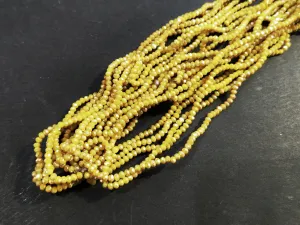 Glass beads, 2x3mm faceted rondelle, solid yellow with half coat Khaki color | 玻璃珠, 2x3mm, 切面扁珠, 實色黃 x 電鍍卡其色