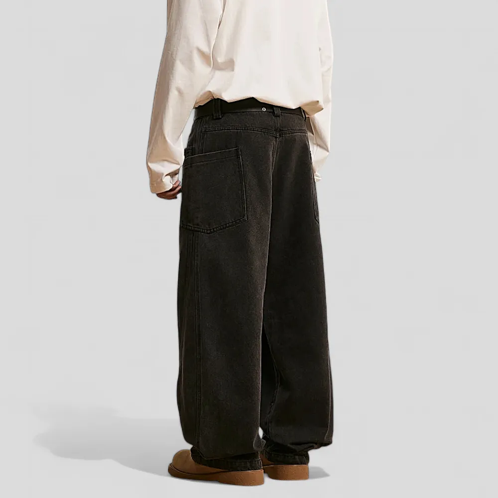 Loose fit washed denim curve seams jean